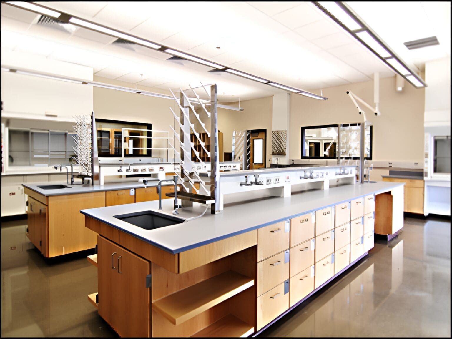 Modern science lab with long workbenches.